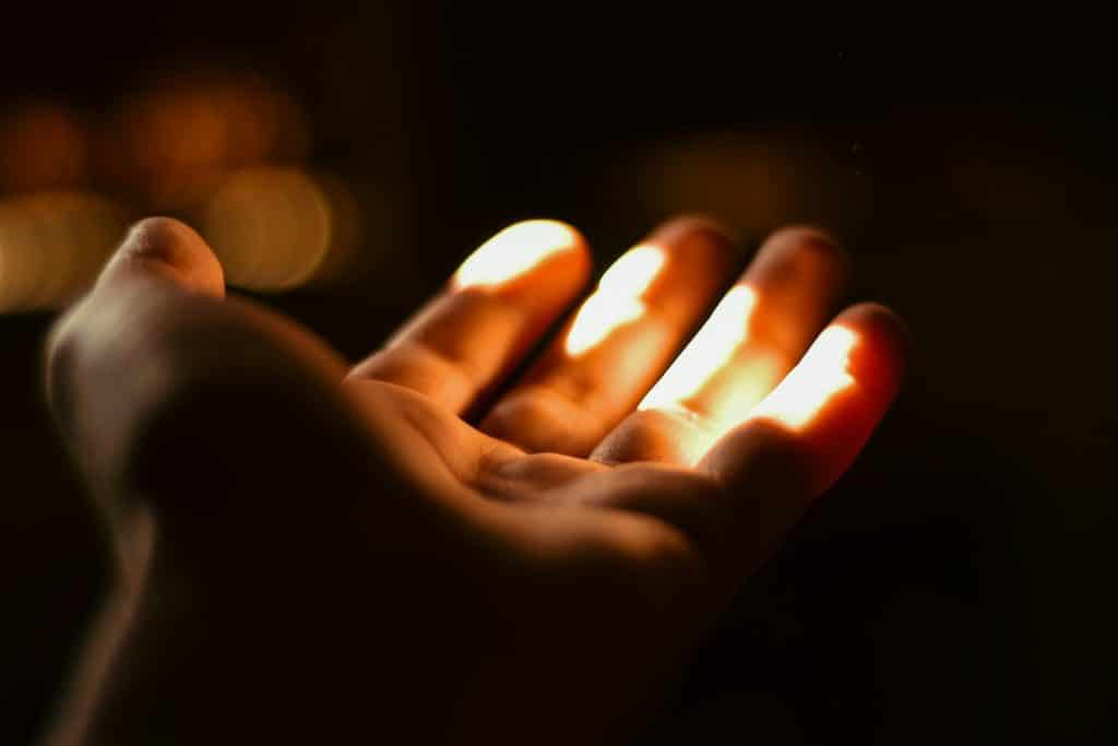 A person holding out their hand